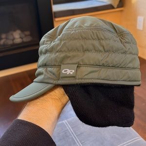 Outdoor Research warm cadet hat with ear flaps in army green, size Medium